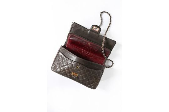 A Chanel quilted brown leather flap bag, 1960s, stamped in gold to the interior 'Chanel', - Image 6 of 8