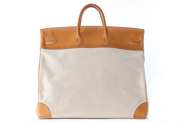 An Hermès Haut à Courroies overnight bag, 1990, blind stamp T, of canvas and tan leather, - Image 6 of 8