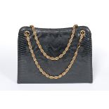 A Cartier blue/black lizard handbag with alternative pouches, 1960s, Varanus Salvator,
