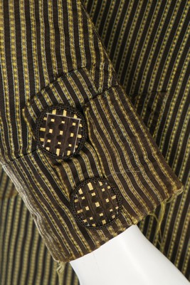 A young man's striped black and yellow silk tailcoat, circa 1790-1800, with high stand collar, - Image 6 of 8