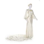 A fine Jeanne Lanvin couture bridal gown, Summer 1935, labelled and numbered 22872 to the slip,