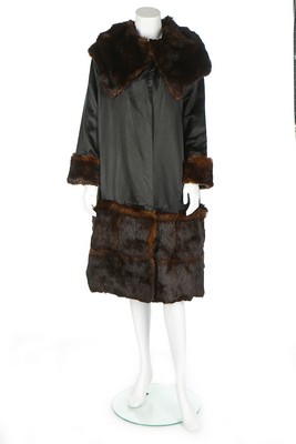 A rare and early Gabrielle Chanel black satin coat, circa 1918-20, - Image 2 of 8