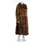 A Liska sable coat, labelled Liska, Vienna, full length, of loose-cut, lined in brown silk,