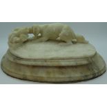 Marble dog sculpture on base