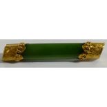 CASED JADE BROOCH WITH 15K MOUNTS