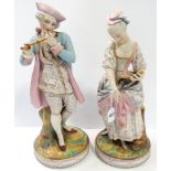 PR OF CONTINENTAL PORCELAIN FIGURINES GENT PLAYING FLUTE, LADY READING 15'H
