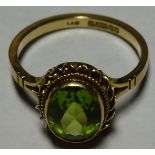 9CT GOLD GREEN STONE SET RING