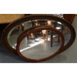 2 OVAL FRAMED MIRRORS