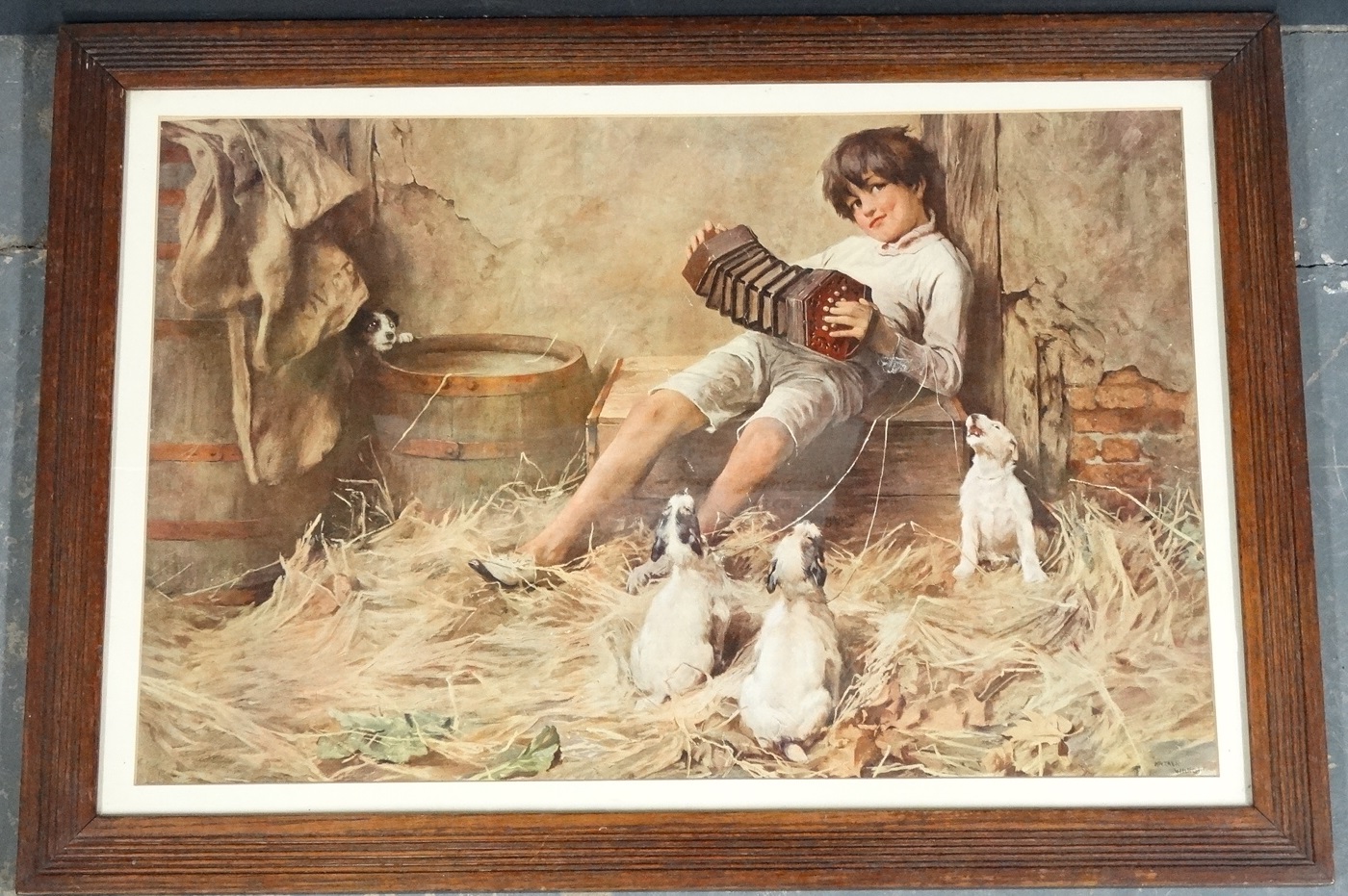 OAK FRAMED COLOURED PRINT BOY IN BARN WITH JACK RUSSELL TERRIERS