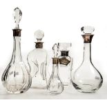 Vier Kristallkaraffen/Decanter Höhe 22 - 36 cm, Silber gestempelt 800 und 925, Beigabe: eine