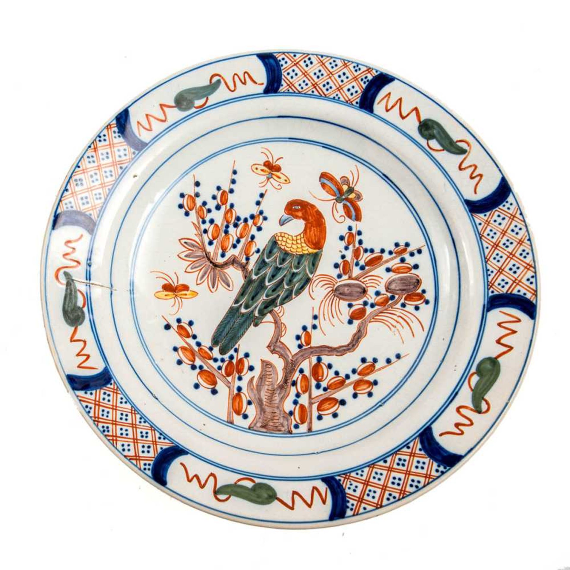 Zierteller, wohl Holland um 1900 Fayence nach chinesischem Vorbild mit Papagei auf Blütenzweig und
