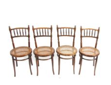Vier Stühle, Josef Hofmann, Wien Buche mit Rohrgeflecht, runder Sitz, durchbrochene Rückenlehne