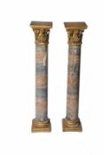 Paar Barocksäulen, Süddeutsch Holz, geschnitzt, Basis und Kapitelle vergoldet, runde Säulen in