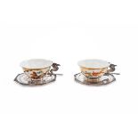 Paar Teetassen mit UT, Vietnam 900er Silber, Porzellan teilw. vergoldet polychrom bemalt. Wandung