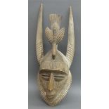 Holzmaske geschnitzt, Afrika, mit Aufbau, 1. Hälfte 20. Jh., h 65 cm,