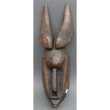 Holzmaske geschnitzt, Afrika, mit Aufbau, 20. Jh., h 50 cm,