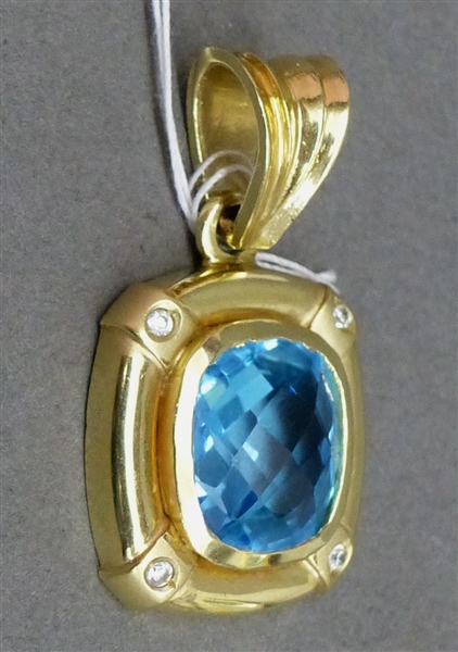 Anhänger 14 kt. Gelbgold, 1 Blautopas, 4 Diamanten zus. ca. 0,04 ct., ca. 6 g schwer,