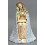 Porzellanskulptur Madonna mit Jesuskind und Blume, auf dem Schoß ein Buch mit einem Vogel,