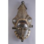 AFRIKANISCHE MASKE wohl 19. JH, Holz geschnitzt, H 55 x B 27 cm 20.17 % buyer's premium on the