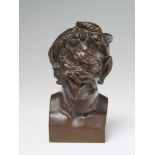 A bronze bust of a laughing satyr With brownish patina. Stamped to the reverse "C. Fischer. Fec: