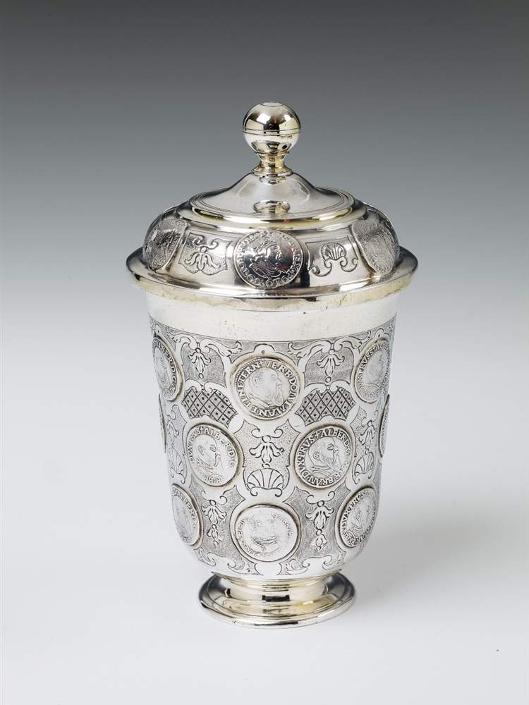 A Berlin partially gilt silver coin-set beaker. Decorated throughout with 24 16th and 17th century P