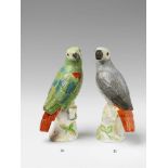 A large Berlin KPM porcelain model of a grey parrot Blue sceptre mark to the back of the base, the