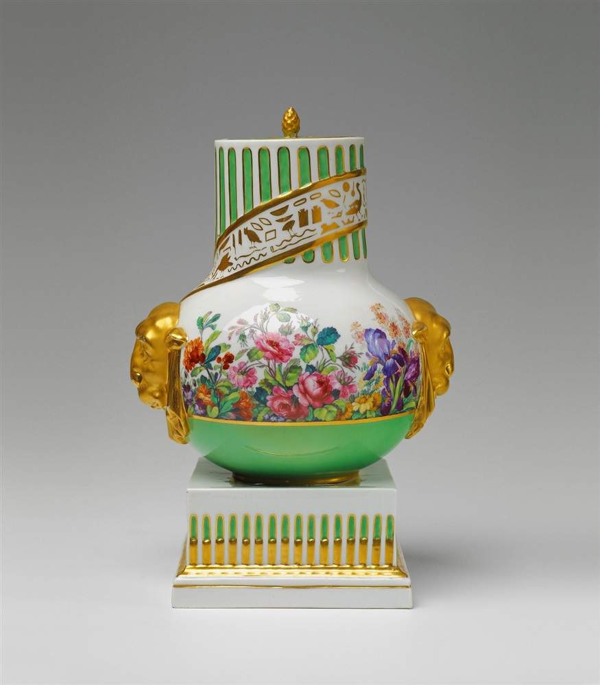 A Berlin KPM porcelain potpourri vase with "fleurs en terrasse" Baluster form vase on a square