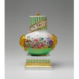 A Berlin KPM porcelain potpourri vase with "fleurs en terrasse" Baluster form vase on a square