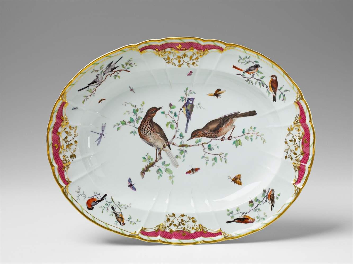 A Berlin KPM porcelain platter made for Count Rothenburg With gilt relief decor interspersed with