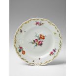 A Berlin KPM porcelain plate made for Berlin Palace. With bold floral and insect decor. Blue sceptre