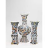 An impressive three piece set of Berlin faience vases with 'grand feu' decor Flattened unmarked