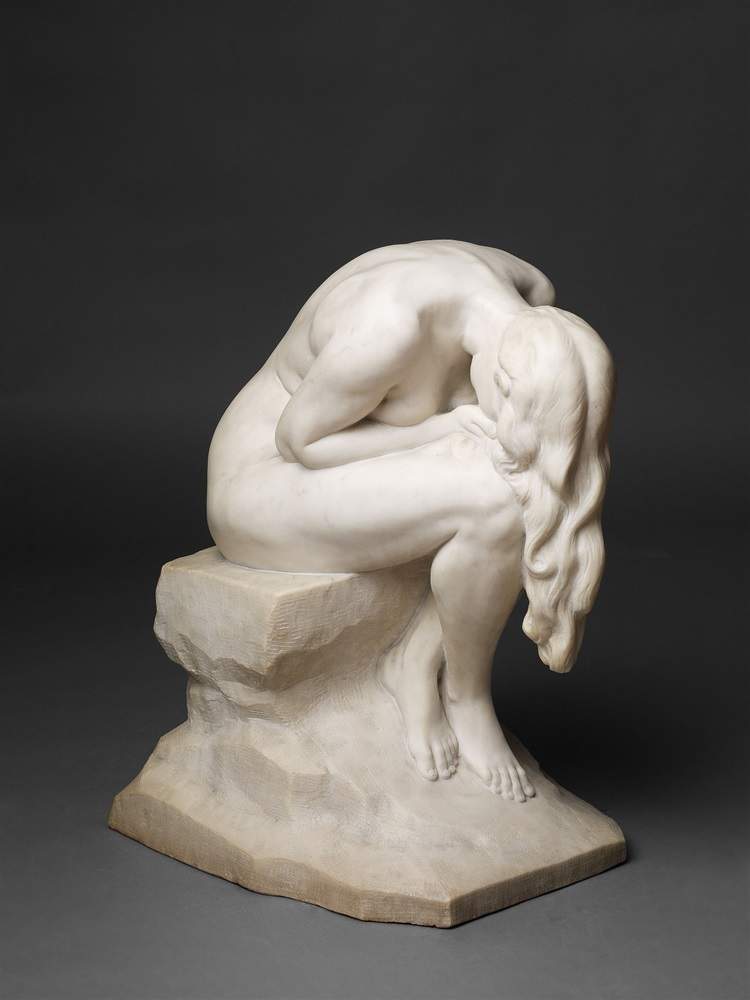Le Repentir Alabaster. A figure of a seated woman with her head resting on her knees, her long