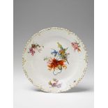 A large Berlin KPM porcelain platter Decorated to the centre with a poppy flower and with a slightly