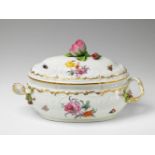 An oval Berlin KPM porcelain tureen with a rose finial Decorated with flowers and insects; with