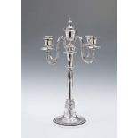 A Berlin silver four flame candelabrum from the court inventory of William II. Engraved in two medal