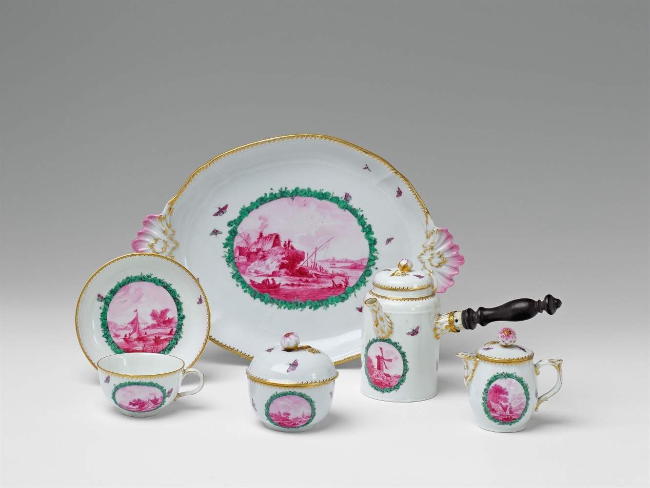 A Berlin KPM porcelain solitaire with river landscapes Comprising a tray, teapot, jug and cover,