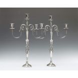 A pair of Berlin silver Neoclassical three-flame candelabra. Marks of Leberecht Fournier, 1817 - 19.