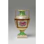 A Berlin KPM Neoclassical porcelain vase Decorated with roses, tendrils and forget-me-not flowers in