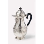 A Berlin rococo silver coffee pot. Engraved to the underside "JCLK". Marks of Christian Ludwig Pints