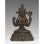 Shadakshari Avalokiteshvara. Bronze. Tibet. 15./16. Jh. Auf einem Lotos sitzend, die Haupthände in