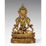 Prächtige Figur des Buddha Akshobhya. Feuervergoldete Bronze. Tibet. 17. Jh. Tib. mikyöpa, einer der