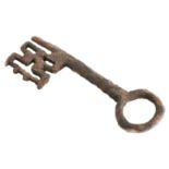 Wrought iron key. Romanesque. 12th/13th century. Accompanied by a document from the Musée d'