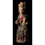 "Virgin in Majesty (Sede Sapientiae)". Carved wooden polychrome sculpture chiefly in reds, blues and