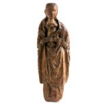 "Virgin with Child". Carved wooden sculpture with polychrome residue. Mechelen. Circa. 1515. The