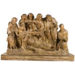 "Lamentation over the Dead Christ." Important carved wooden sculpture with slight traces of