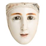 Head of a virgin statue sculpted in ivory and painted, with glass eyes. Hispanic-Philippine