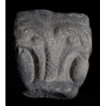 Sculpted limestone capital. Romanesque. Mid 13th century. 24 x 20 x 19 cm.