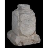 Sculpted stone column base, with a rather eroded relief of Saint George. Circa 1500. 44 x 30 x 30