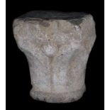 Sculpted stone capital formed by four leaves. Circa 1300. 28 x 24 x 24 cm.