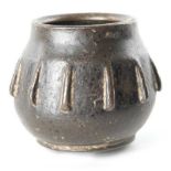 Small lost-wax cast bronze mortar. It has a rounded shape with twelve ribs. Morisco Hispanic art.